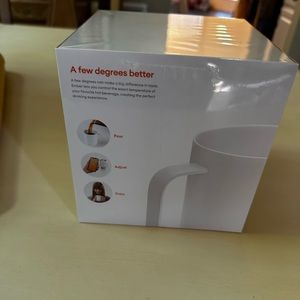 New in box Ember Smart Mug to keep your coffee and tea hot. Work with your phone